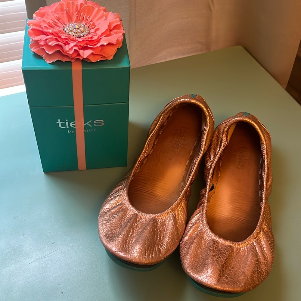 Tieks Rose Gold metallic flats with box and flower